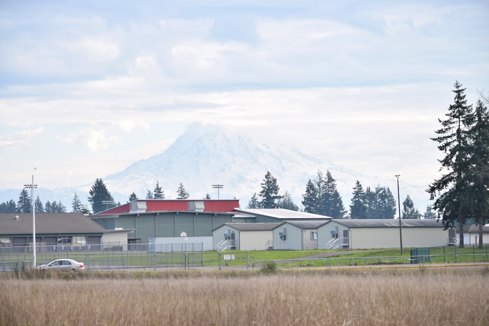 a building with a mountain in the background