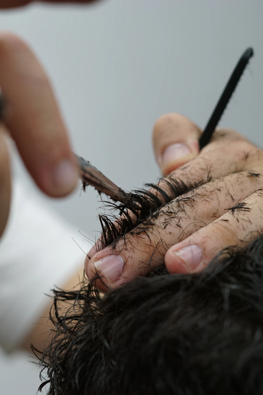 Careful hair care routine being performed on damp hair