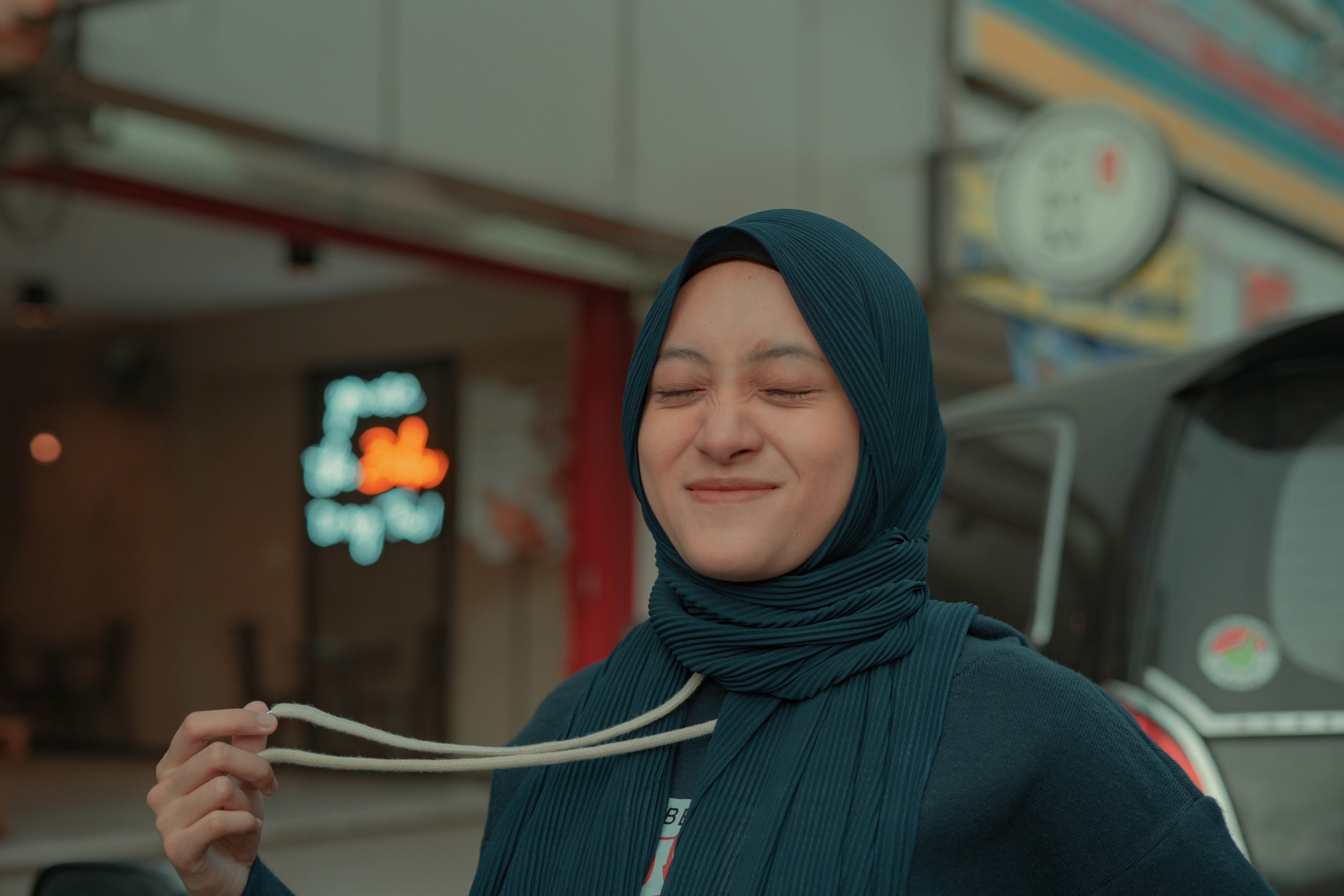 A Girl Smiling Closed Her Eyes