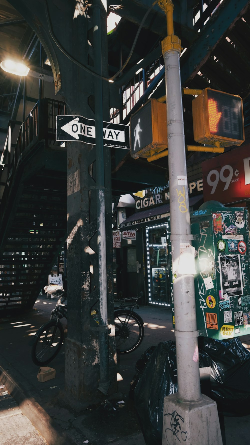 a street sign on a pole in a building