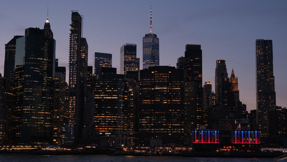 a city skyline with a lot of tall buildings