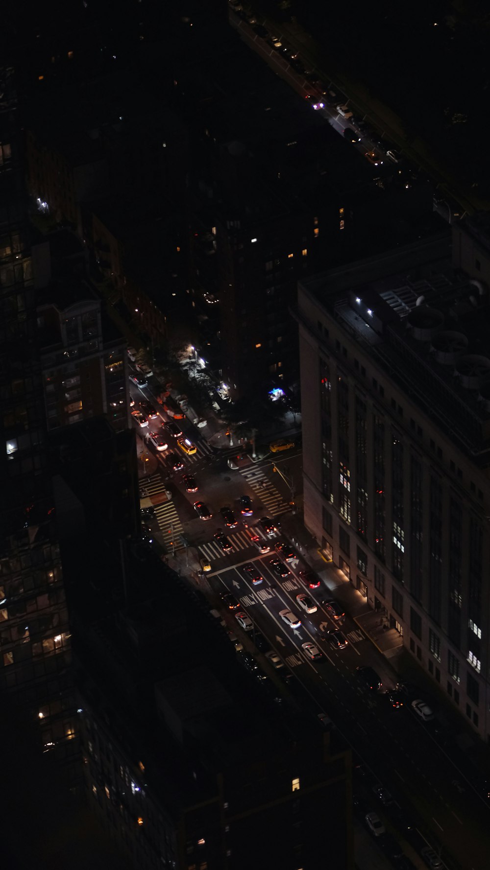 an aerial view of a city at night