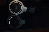 a pair of headphones sitting on top of a table