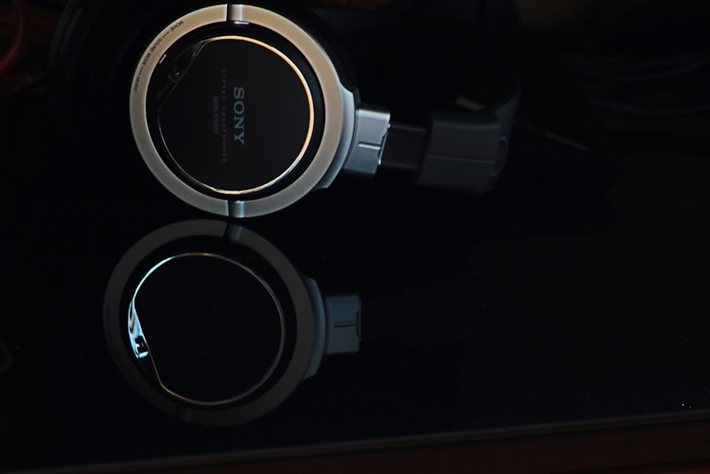 a pair of headphones sitting on top of a table