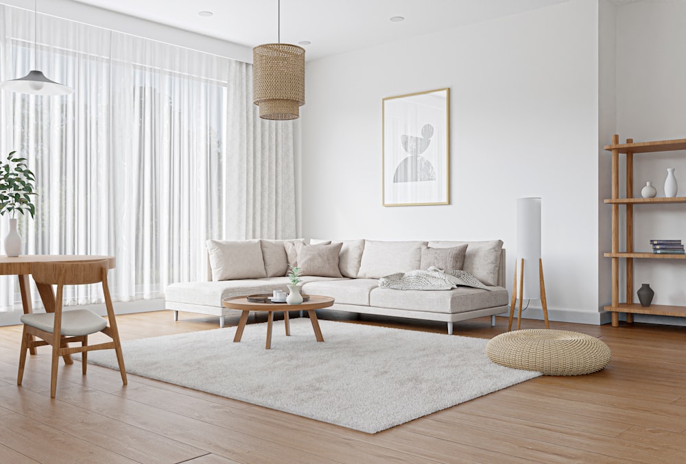 a living room filled with furniture and a wooden table