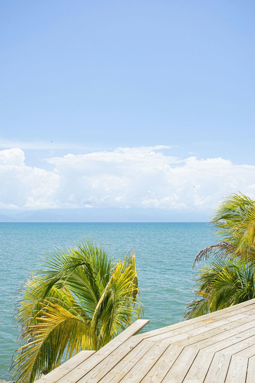 a view of a body of water from a deck