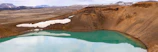 Panoramic view of the crater lake from the summit during a clear morning.