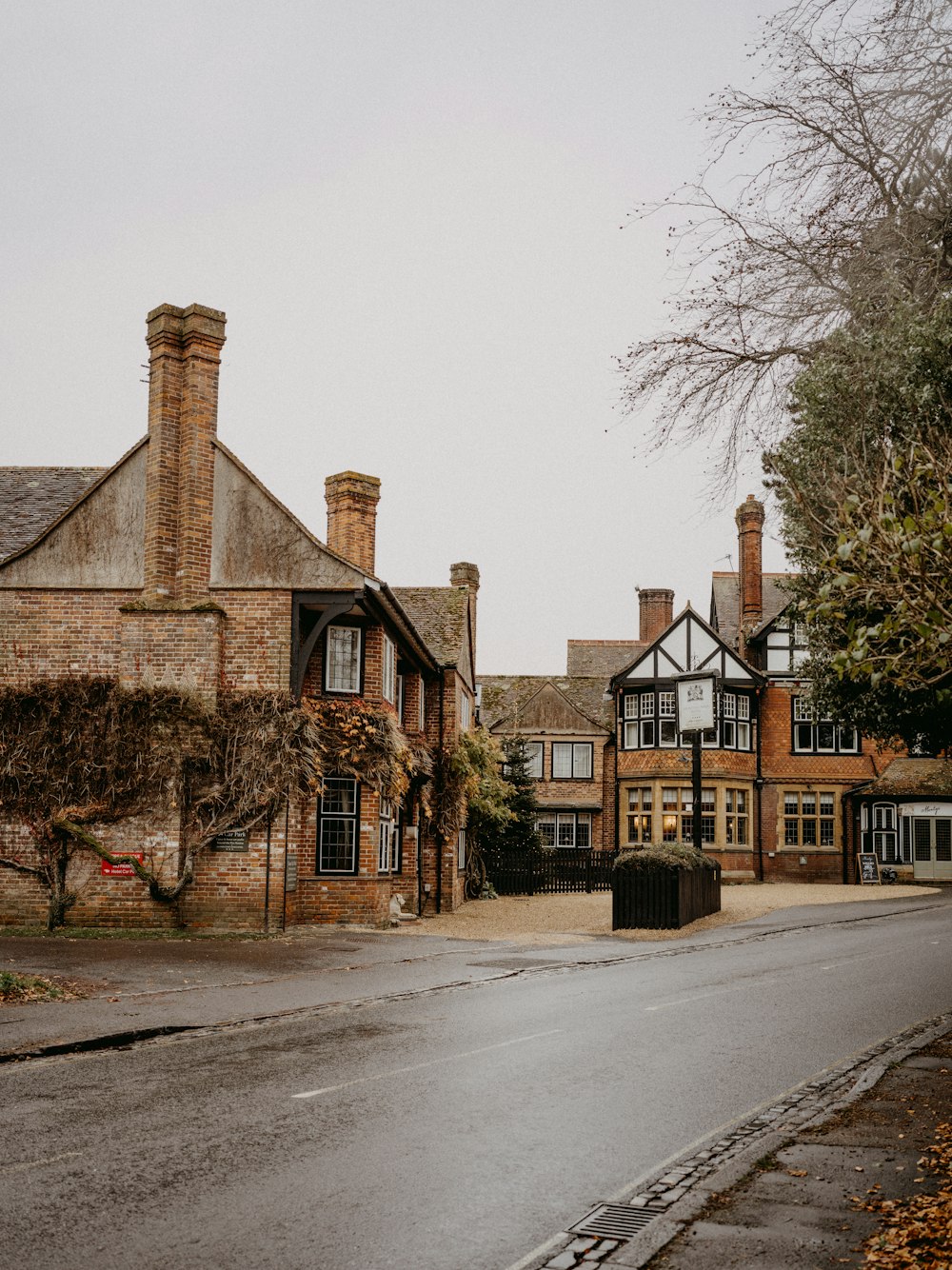 a large brick building sitting on the side of a road