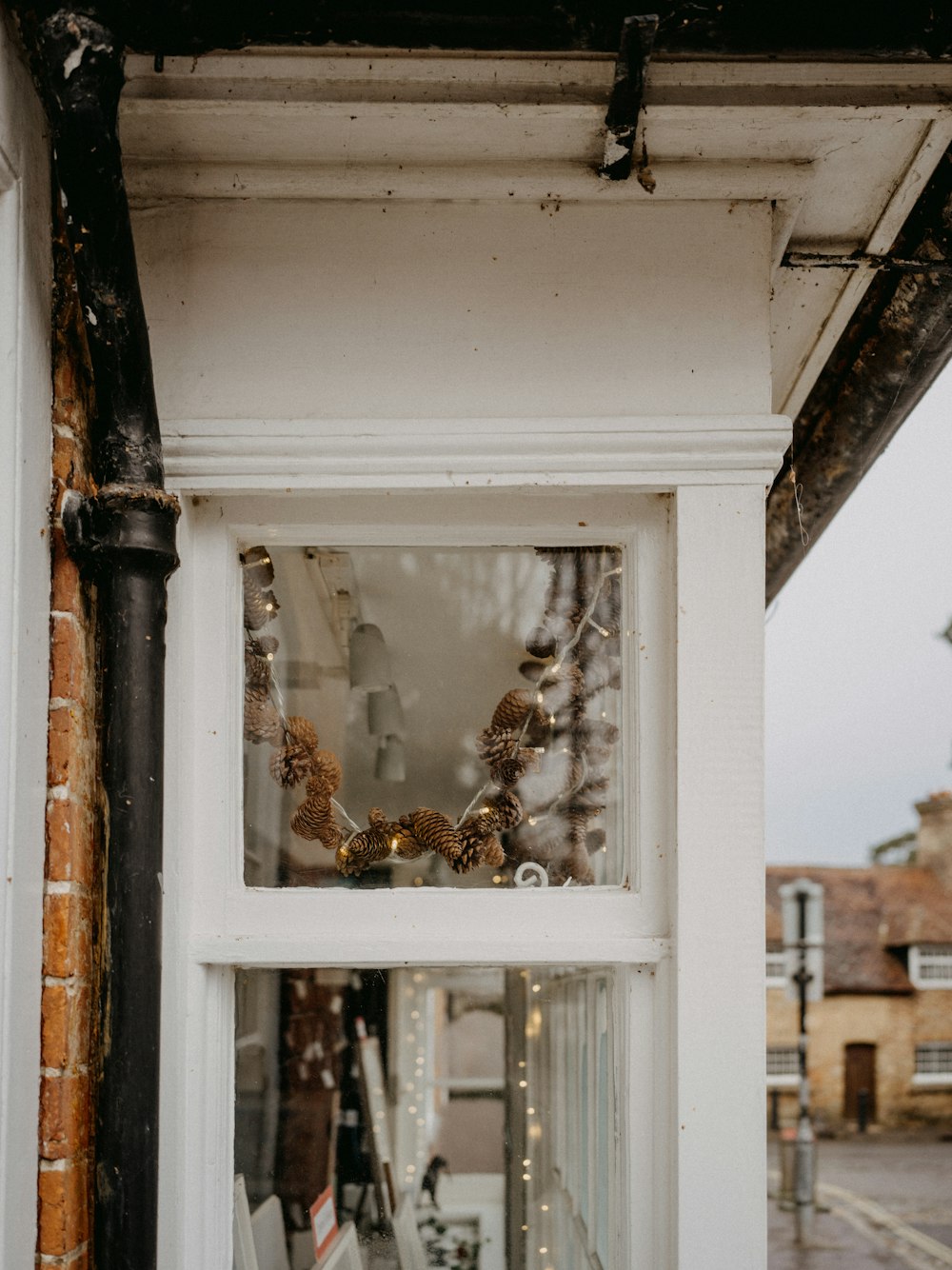 a window that has a bunch of beads in it