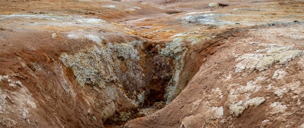 a large hole in the ground that is filled with dirt