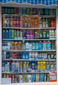 a display case filled with lots of different types of cleaning products