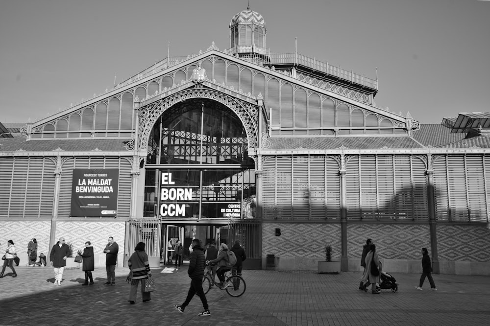 a black and white photo of a train station