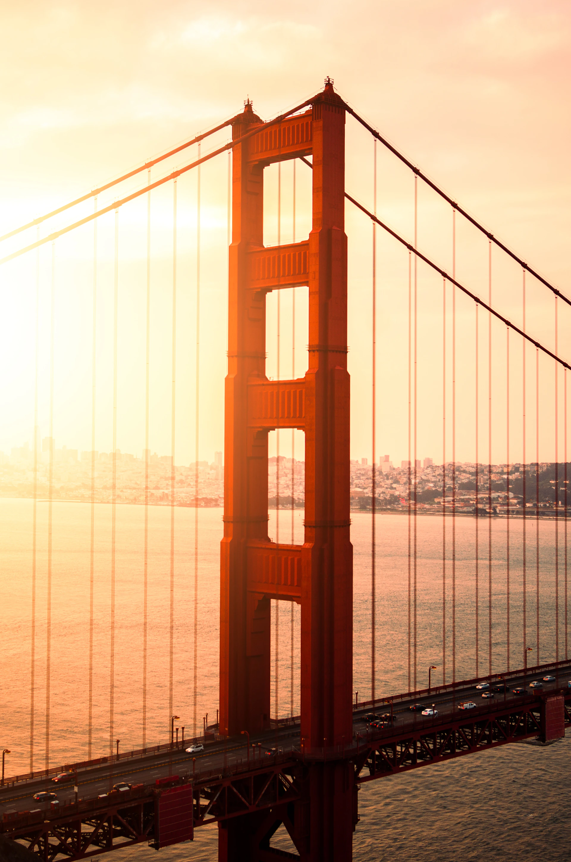 a view of the golden gate bridge at sunset