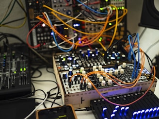 a bunch of electronic equipment sitting on top of a table