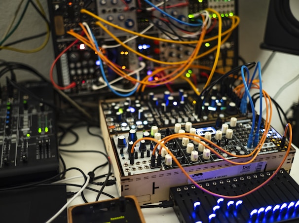 a bunch of electronic equipment sitting on top of a table