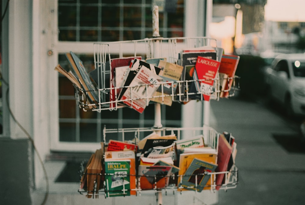 a shopping cart filled with lots of books