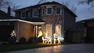 A beautifully decorated home with commercial-grade holiday lights.