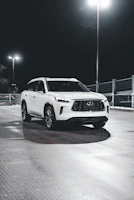 A sleek Mazda CX-5 shining under soft natural light on an empty urban street