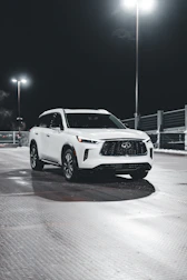 A large SUV with spotless interior and polished exterior under natural light.