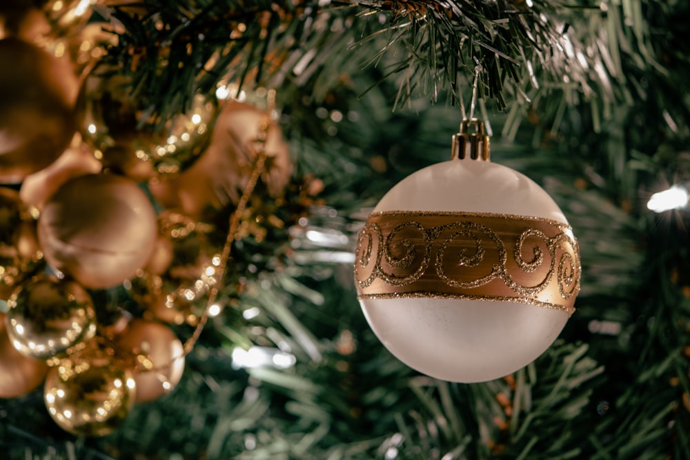 a christmas ornament hanging from a christmas tree