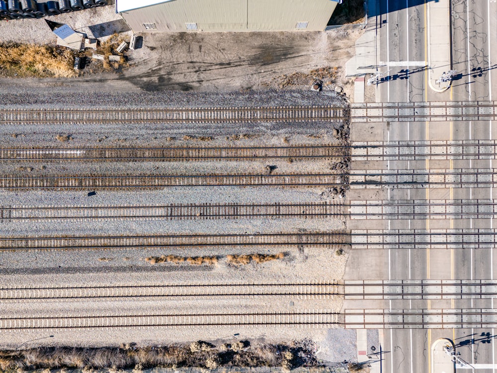 an aerial view of a train yard and tracks