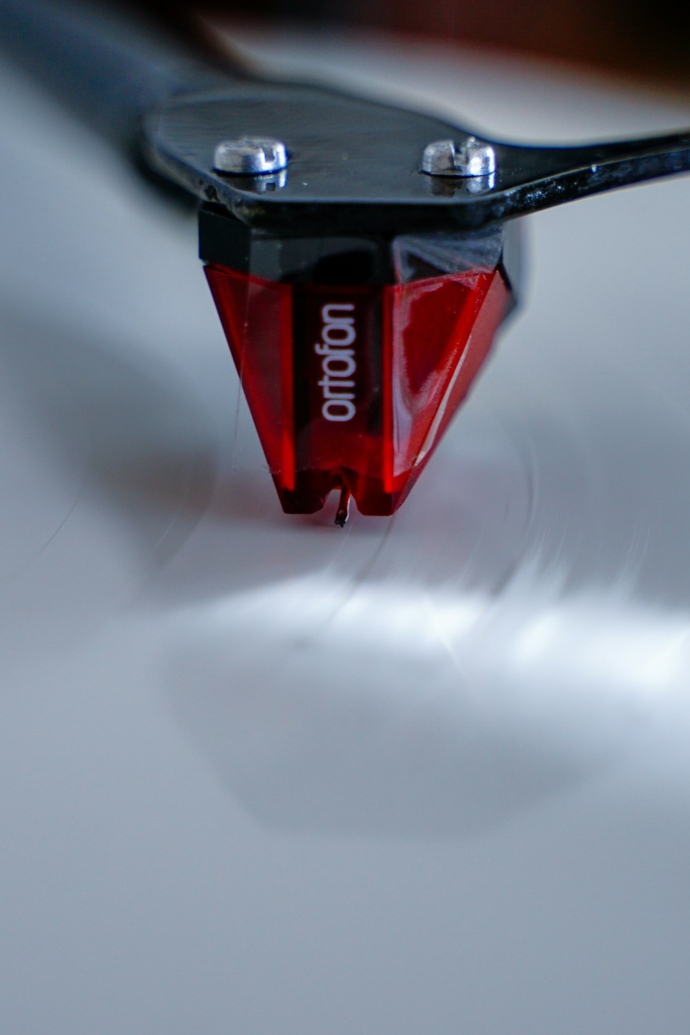 a close up of a pair of scissors on a table