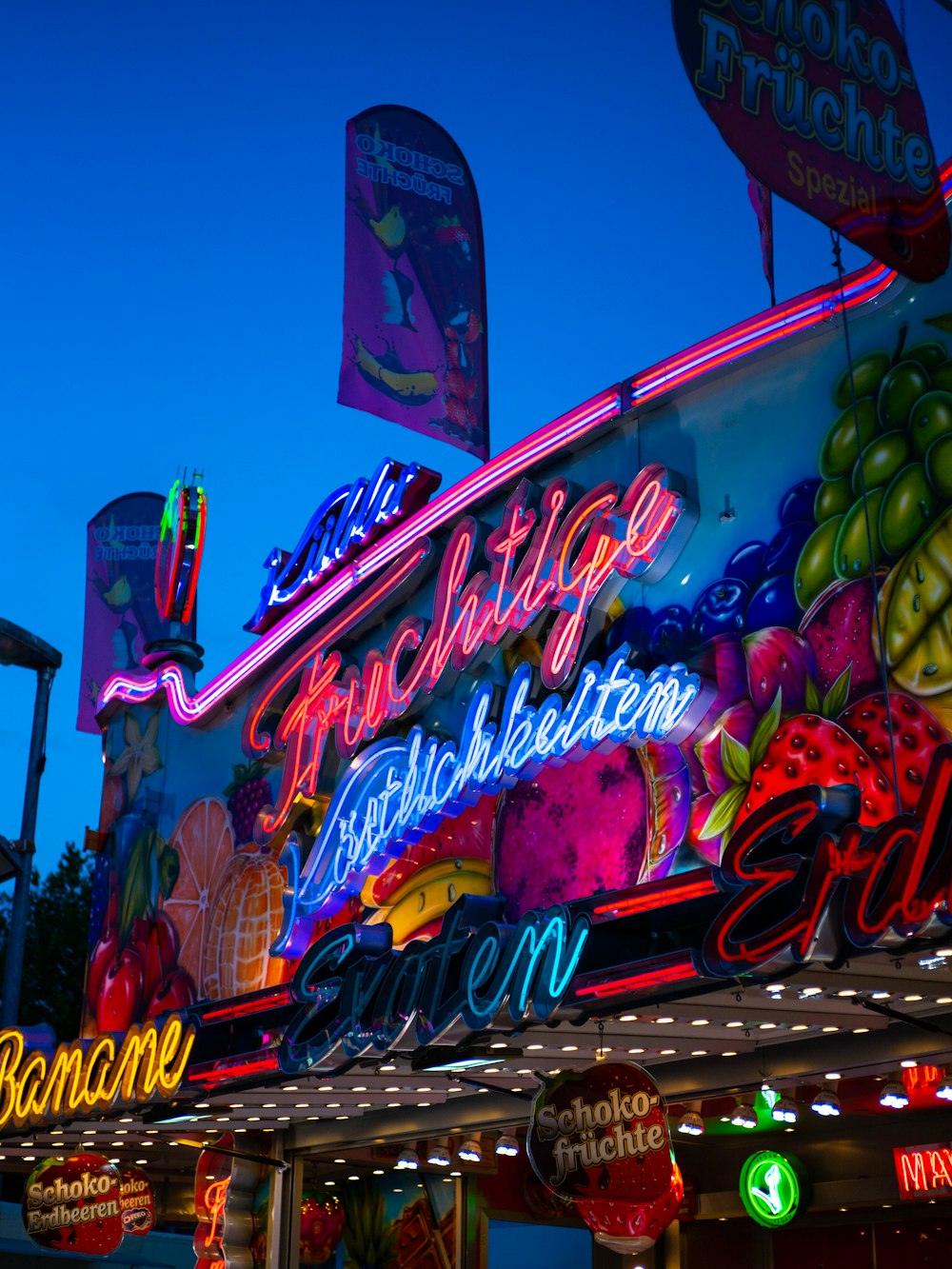 a neon sign is lit up at night