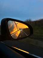 Aa rear view mirror on a car. Trauma therapist in Fort Mill SC.
