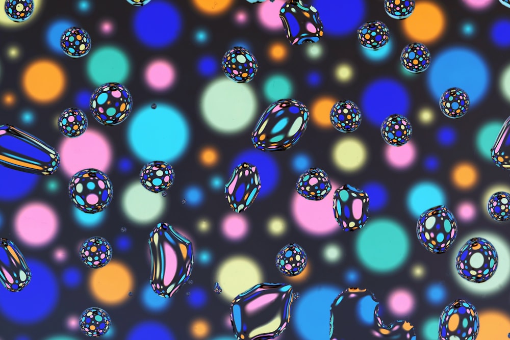 colorful bubbles floating on a black background