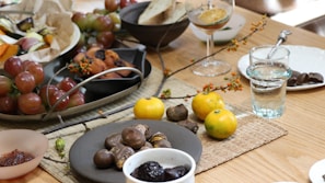 Fresh dry fruits and barley grains artfully arranged on a rustic wooden table