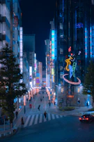 Nighttime cityscape of Philadelphia with neon signs and bustling streets reflecting the music scene energy.