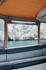 Close-up of a freshly upholstered boat seat with navy blue marine canvas.