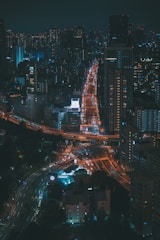 an aerial view of a city at night