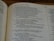 An open book displaying text content from 'The Books of the Prophets.' The text discusses themes of idolatry, spiritual infidelity, and divine punishment. The page number shown is 677. The book is placed on a wooden surface.