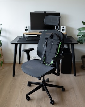 a chair that is sitting in front of a desk