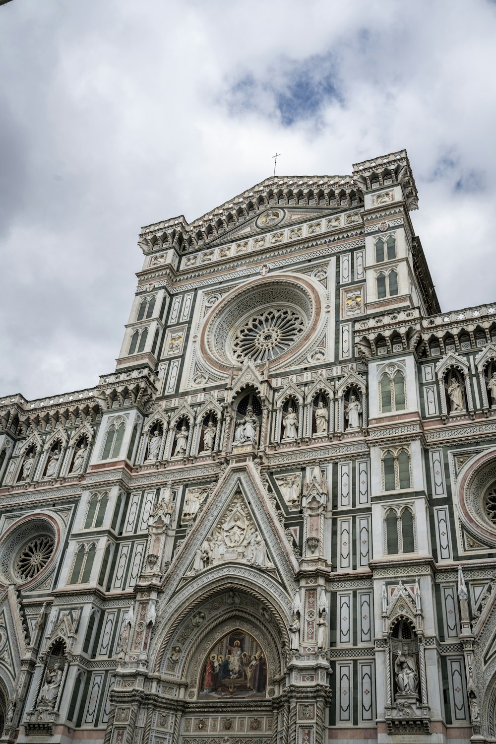 a large cathedral with a clock on the front of it