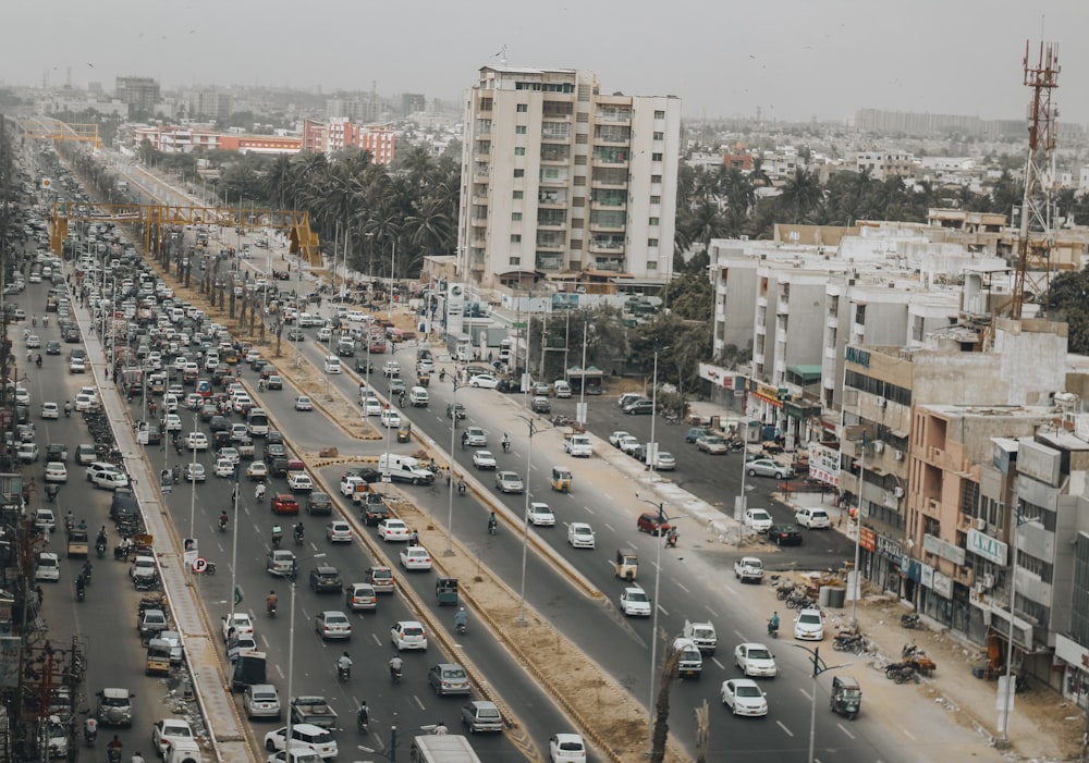 a city street filled with lots of traffic