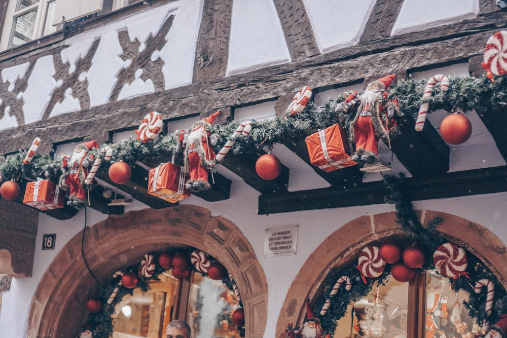 a building decorated with christmas decorations and candy canes