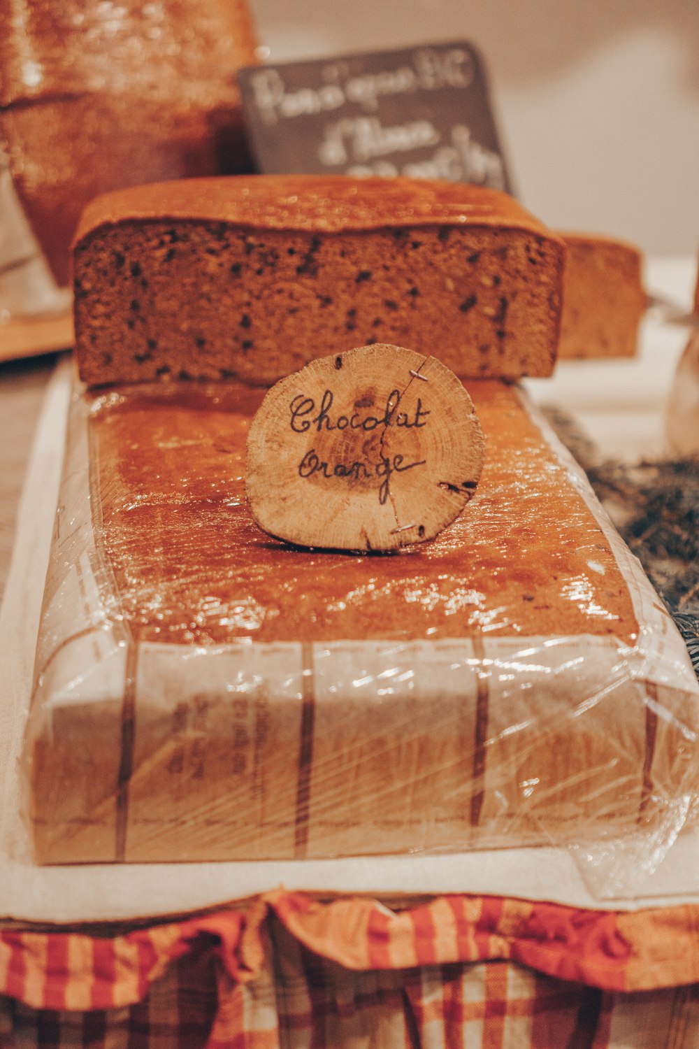 a loaf of bread with a piece of bread on top of it