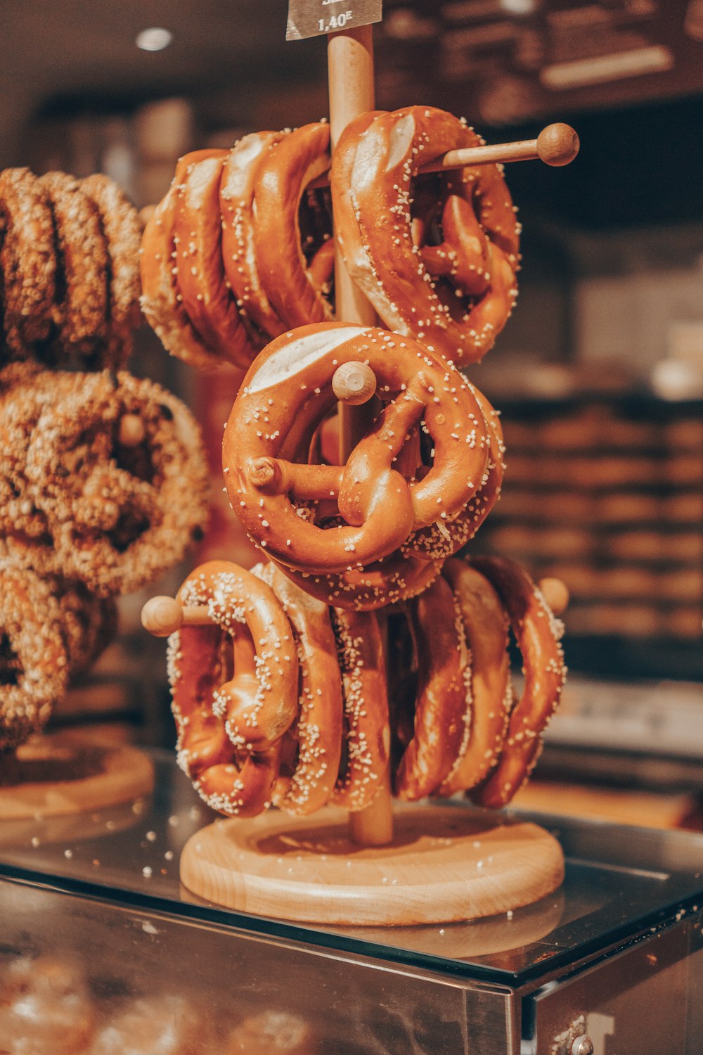 a bunch of pretzels are hanging on a rack