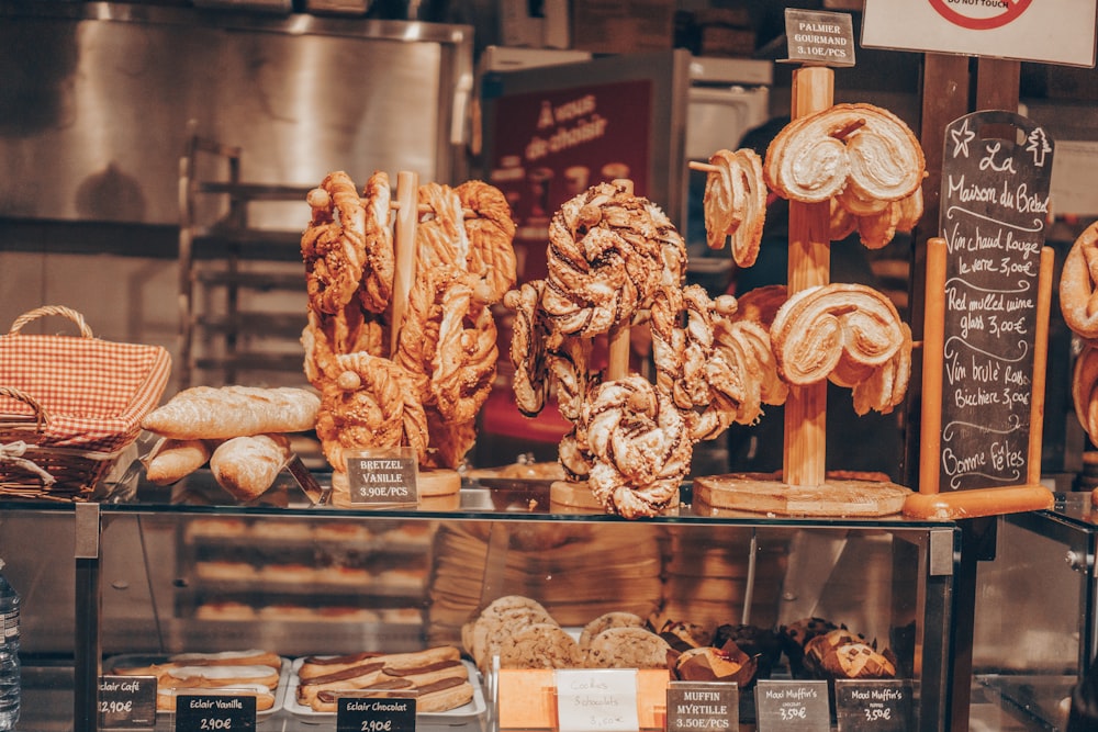 a bunch of different types of bread on display