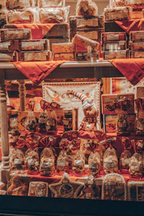 A warm, festive display of assorted economical Christmas hampers with colorful packaging