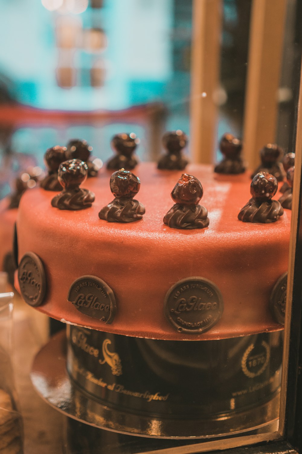 a chocolate cake with chocolate candies on top of it