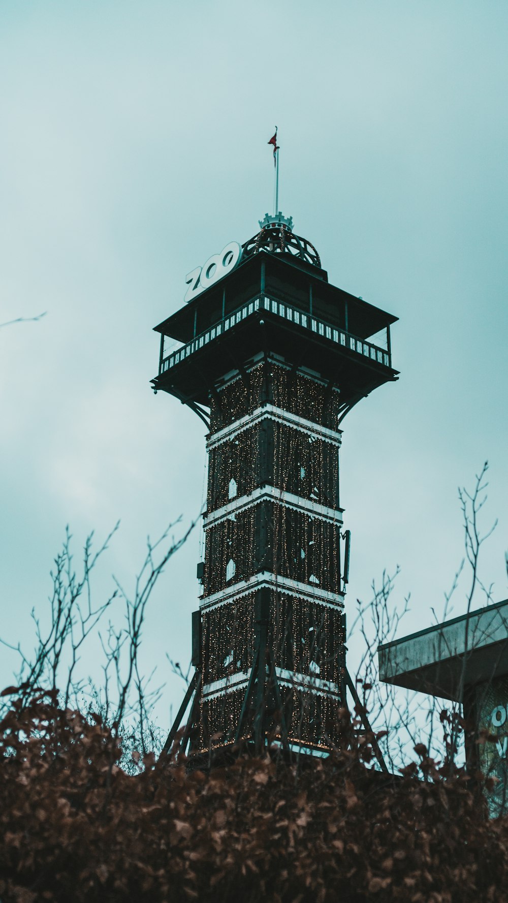 a tall tower with a clock on top of it