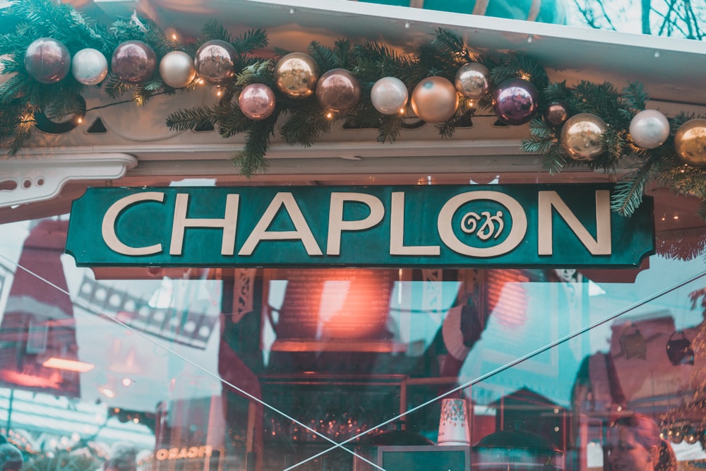 a close up of a street sign in a store window