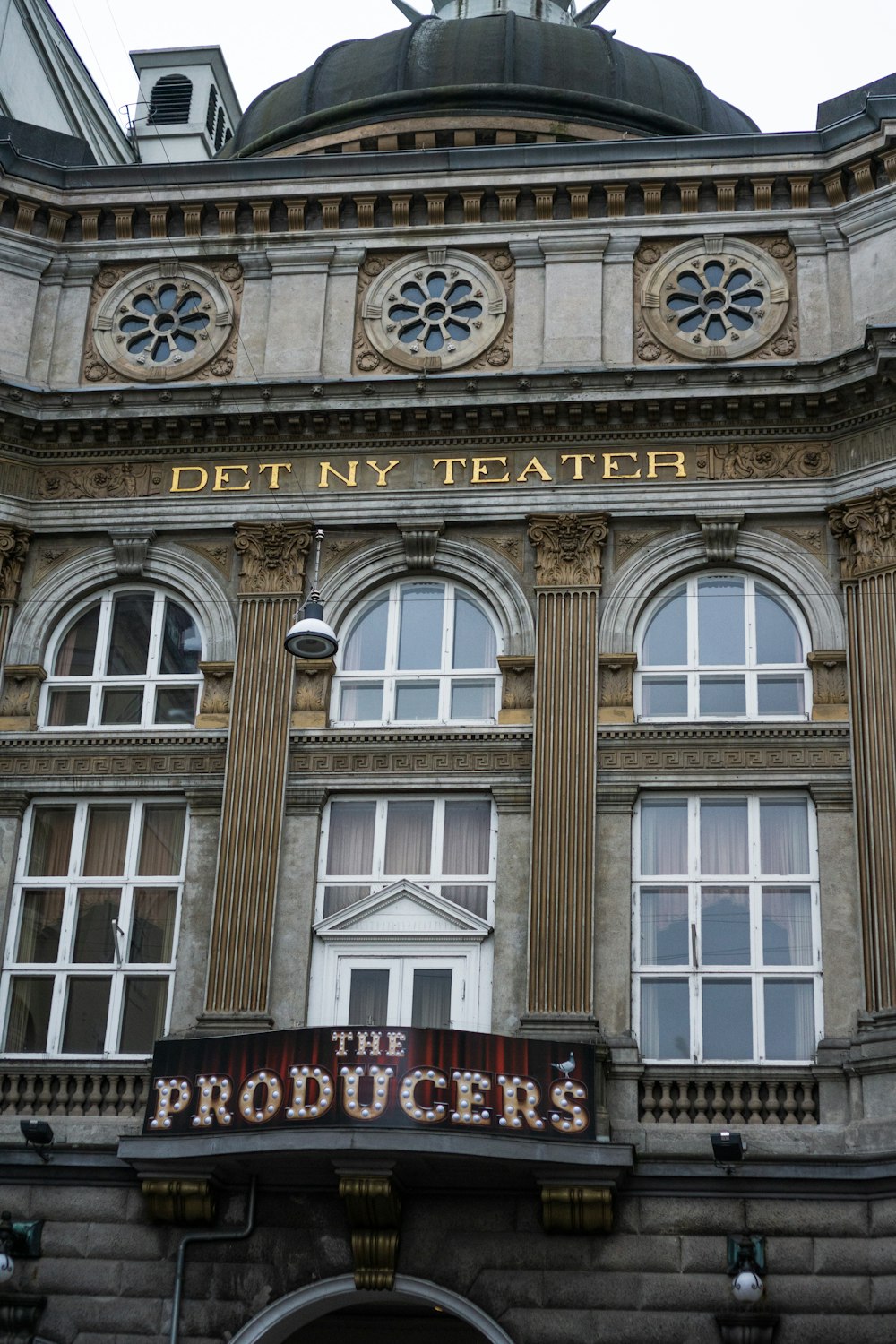 a large building with a sign on the front of it