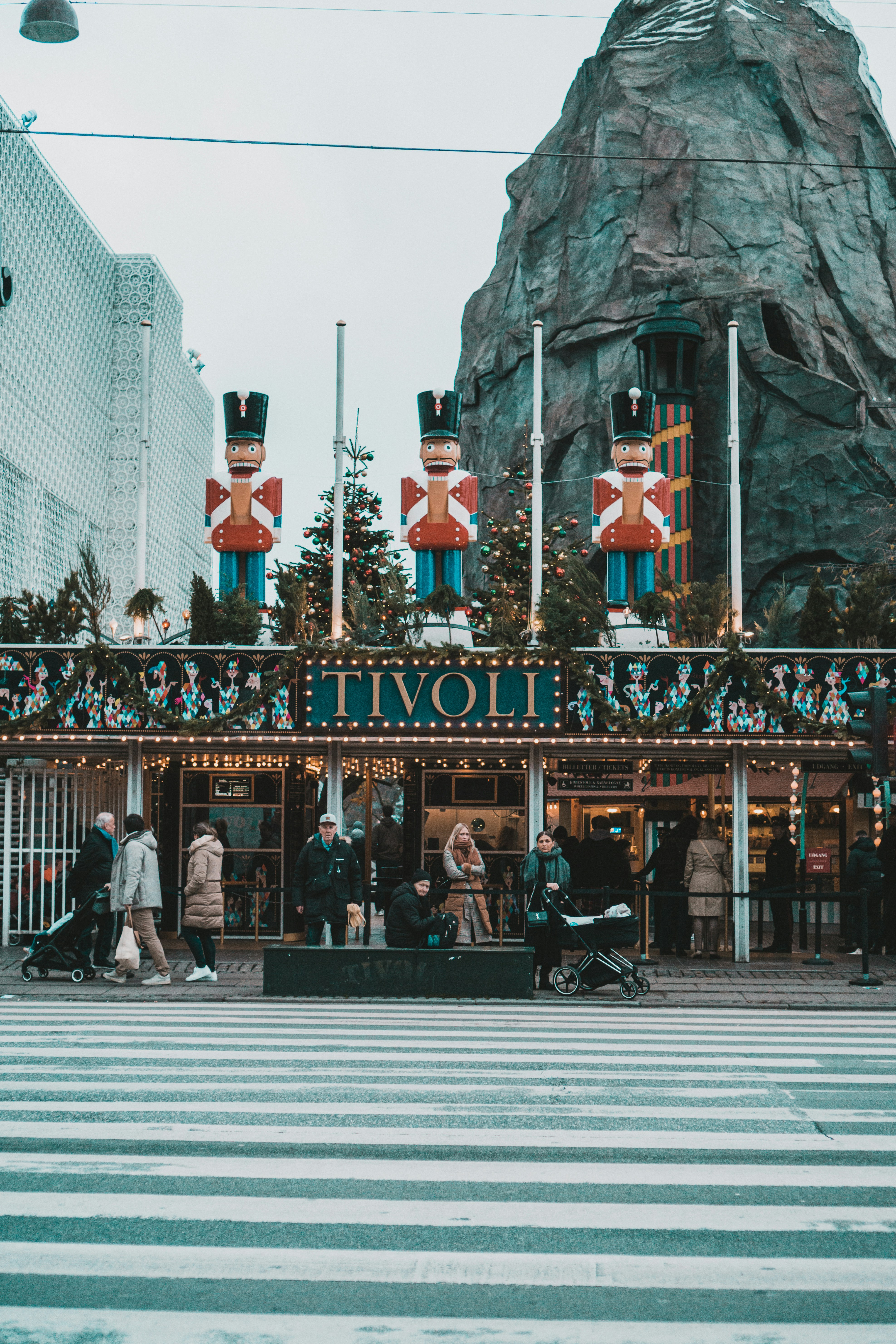 a group of people standing in front of a building