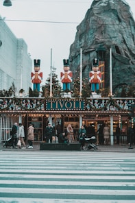 a group of people standing in front of a building