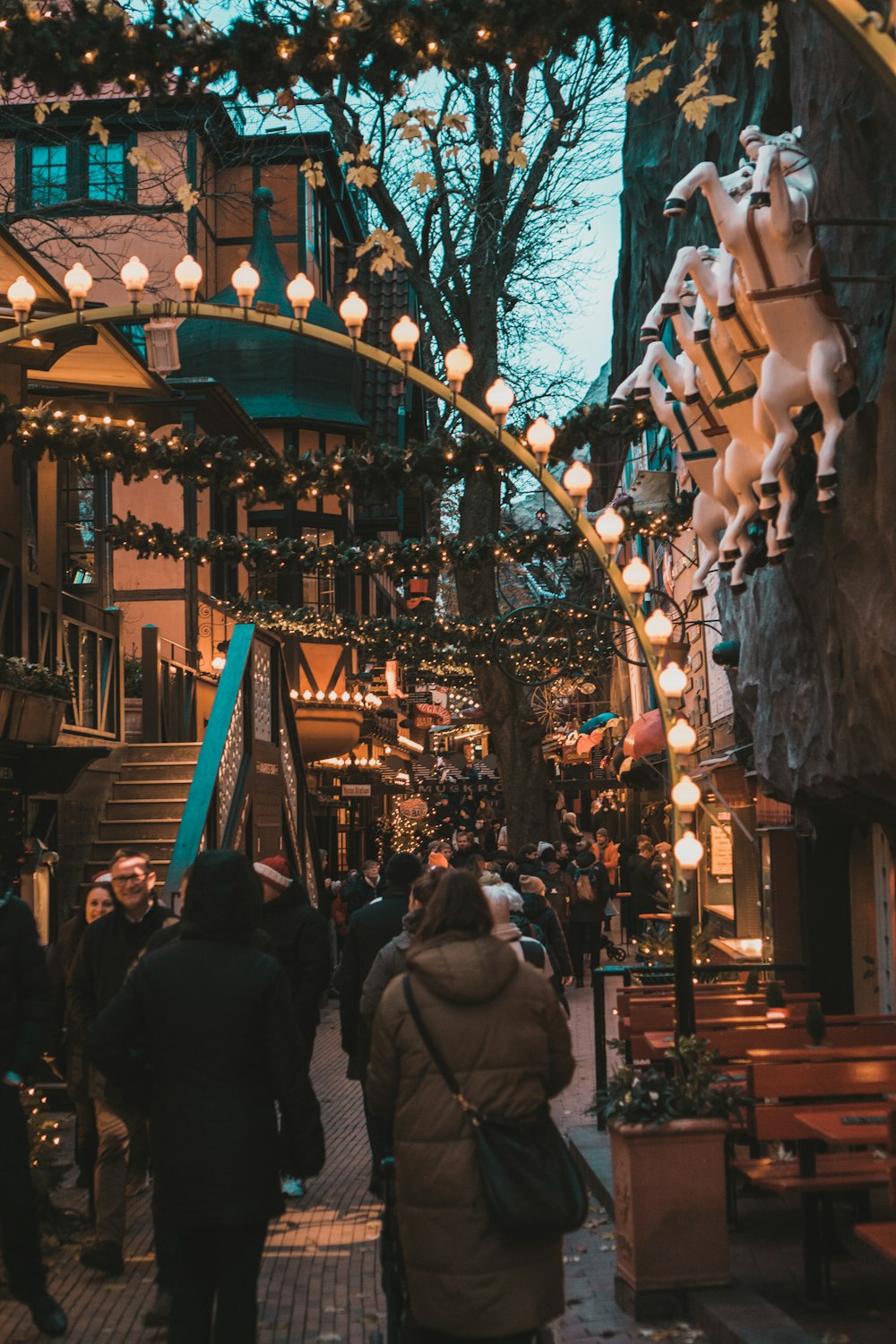 a group of people walking down a street