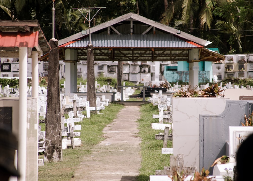 a cemetery filled with lots of white graves